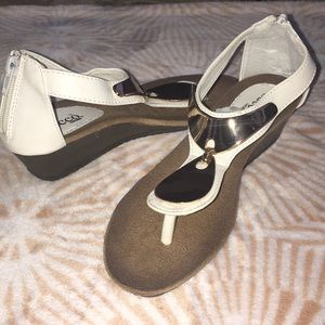 Beautiful sandals in need of home!